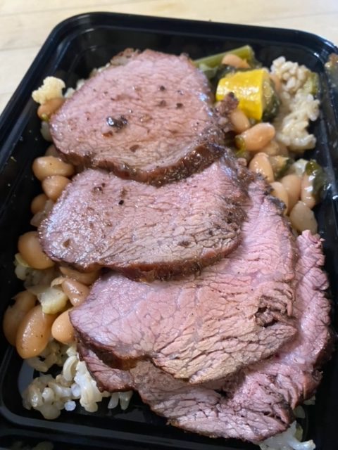 locally sourced catering with Grilled and smoked tri-tip with brown rice and European White bean ragu